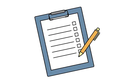 ボールペンとバインダーに挟まったチェックリスト