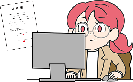 パソコンを操作している助手