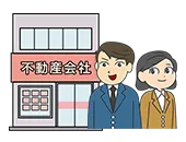 不動産会社の外観とその前に立つ社員の男性と女性