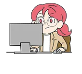 パソコンのモニターを見て作業をしている女性スタッフ